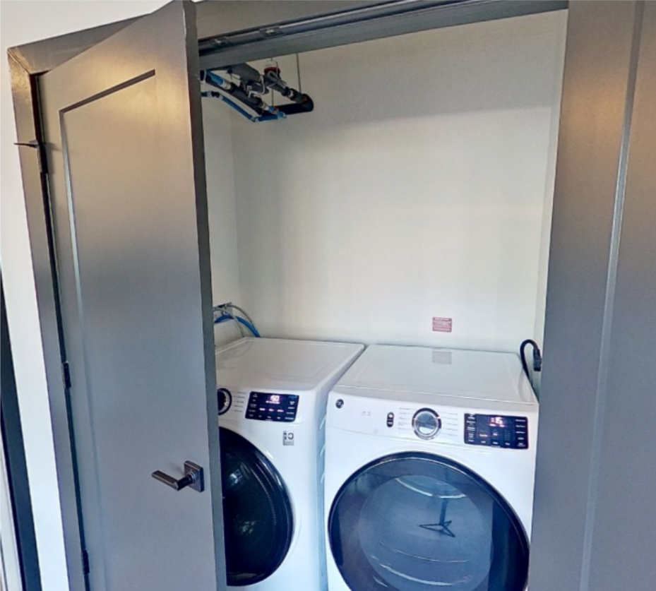 Example of side-by-side washer/dryer featured in accessible apartments.